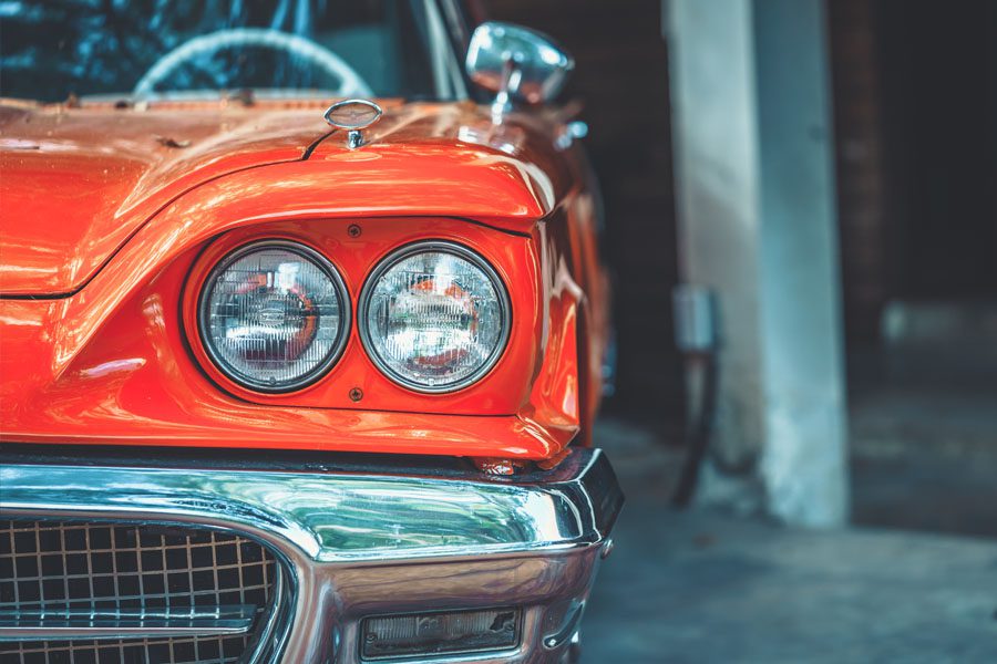 Antique and Classic Car Insurance - Classic Red Car in a Garage