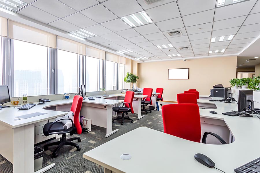 Office-Building-Insurance-Modern-Office-with-Bright-Red-Chairs-with-Big-Windows